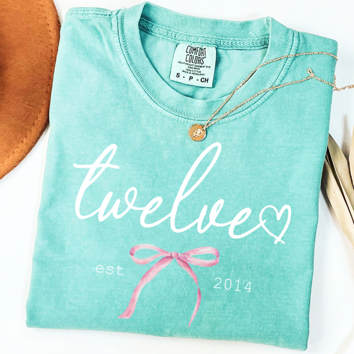 Mint Green Comfort Colors 12th birthday shirt featuring Twelve script and Est. 2014 design, boutique birthday tee for tween girls