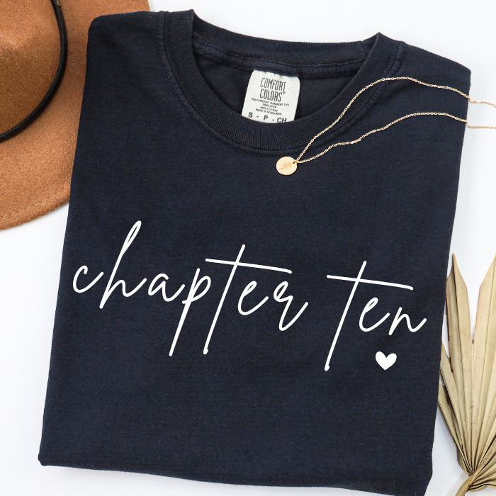 Black Comfort Colors Chapter Ten birthday tee for girls with minimalist white script
