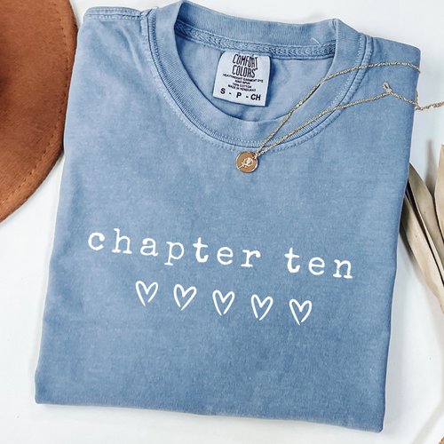 Blue Comfort Colors 10th birthday shirt for girls featuring white Chapter Ten script with heart design