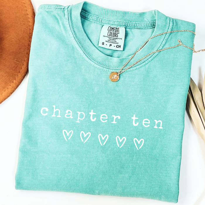 Mint Comfort Colors 10th birthday shirt featuring Chapter Ten lettering and heart accents
